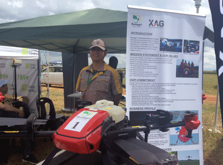 Sunagri Investment Zambia Director Frazer Zhang showcase the XAG (Xaircraft) Drone during the just ended Agritech Expo in Chisamba district, Central Zambia. Photo by Derrick Silimina.